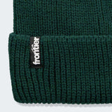 Frontier Ridge Beanie featuring a woven logo label, made from 100% recycled polyester, perfect as a corporate gift.