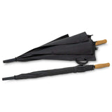 SPICE Waste2Gear Umbrella shown in folded and open position with cork handle and black recycled nylon fabric.