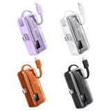Remax FP-108 Mini Powerbank with Cable 5000mAh in multiple colors including purple, white, orange, and black.