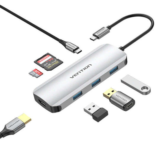 Vention 7-in-1 USB-C Docking Station with HD Display and various connection cables and adapters.