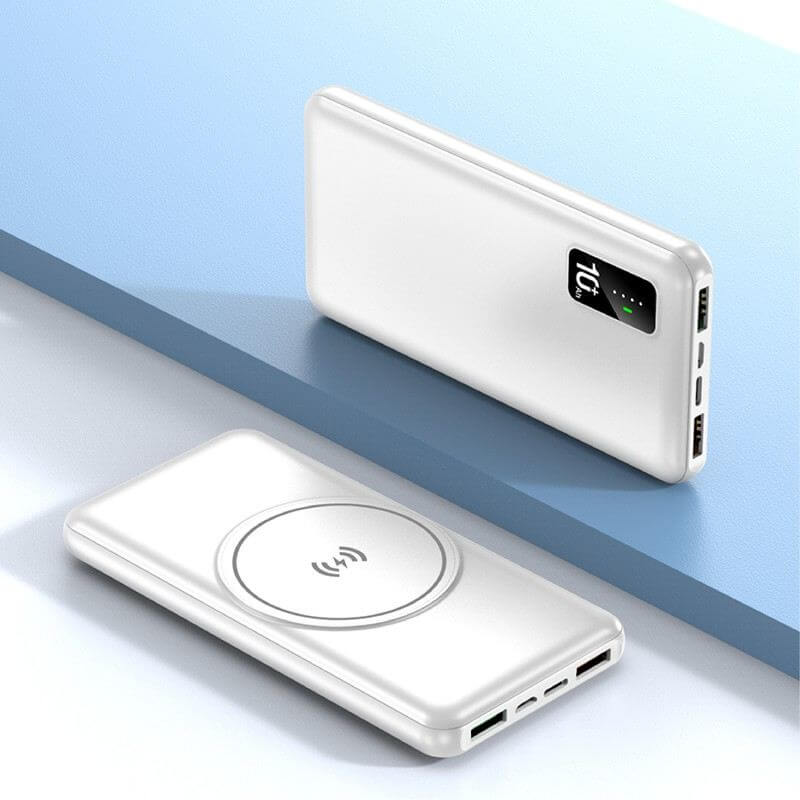 Two white WirelessPower powerbank views showing the black status panel, circular wireless charging face and end-mounted ports