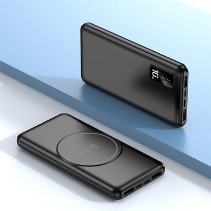 Two black WirelessPower powerbank views showing the status panel, circular wireless charging face and end-mounted USB ports