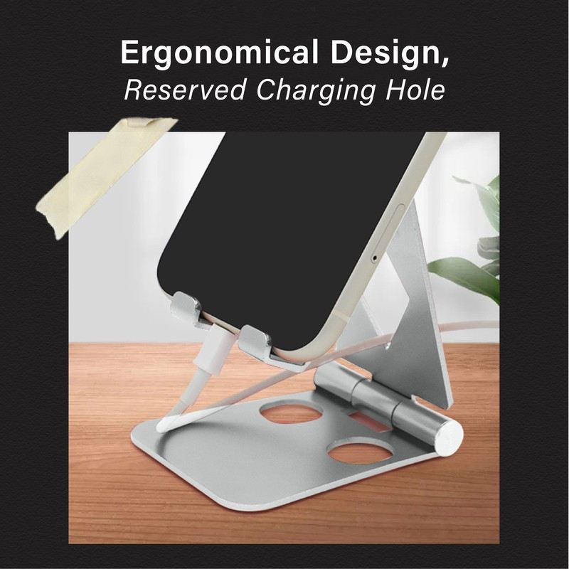 Phone supported on the aluminium stand with a cable passing through the access opening