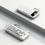 10000mAh Powerbank with Detachable Cables and Wireless Charging on a minimalist surface.