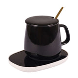 Ceramic Mug Warmer Set featuring a stylish black ceramic mug and warming base, perfect for corporate gifts.