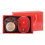 Ceramic Mug Warmer Set in a red box featuring a ceramic mug, warmer, and spoon, perfect corporate gift.