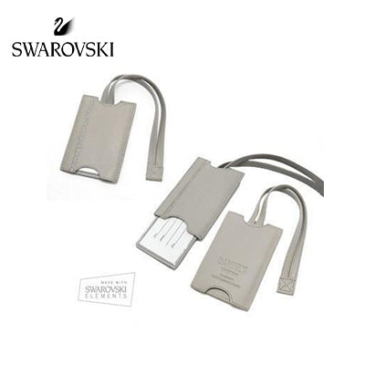 Grey DSE luggage tag shown closed, with sliding contact insert extended, and from the reverse with loop straps