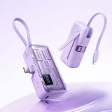 Remax FP-108 Mini Powerbank with Cable 5000mAh in purple color with a folding stand and IPH cable lanyard.
