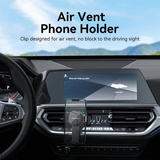 Vention Car Phone Mount securely holding a smartphone in a car's air vent, ensuring hands-free navigation.