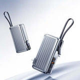Remax CP-11 65W Fast Charging Powerbank with Type C Cable and Wall Plug displayed in a sleek design.