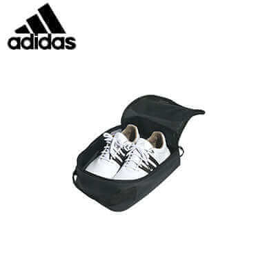 Adidas Grey Golf Shoe Bag with white golf shoes inside, showcasing style and practicality for golfers.