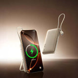 Remax MC-01 Magnetic Wireless Powerbank with Cable and Stand charging a smartphone, featuring a sleek design and foldable stand.