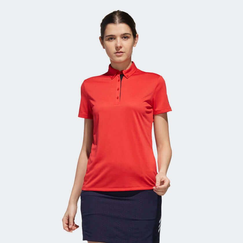 adidas Women's Golf Polo Shirt in red, perfect for style and performance on the golf course.