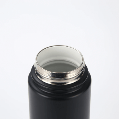 Inside view of the Crossing Urban Ceramic S/S Insulated Flat Cap Bottle With Handle 600ml showing ceramic-coated interior.