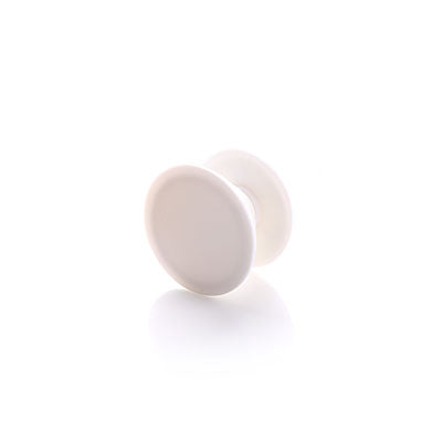 Pale round collapsible phone grip shown extended, with circular front face and rear attachment base
