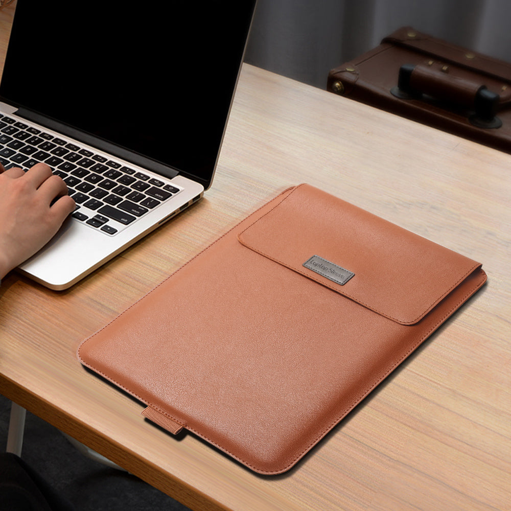 Orange-brown laptop sleeve closed beside an example laptop on a desk