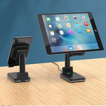 Black adjustable charging stand supporting a tablet in landscape position