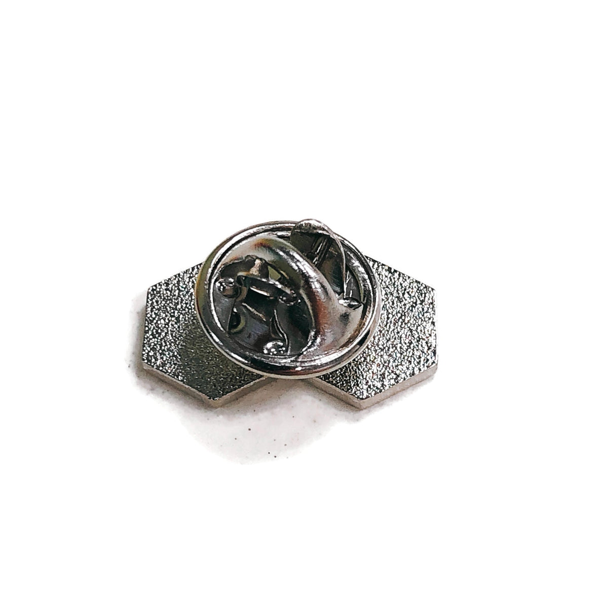 Angled rear view of enamel collar pin with the clutch fastening attached