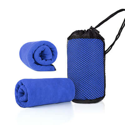Rolled blue microfiber towels beside a black mesh drawstring travel bag