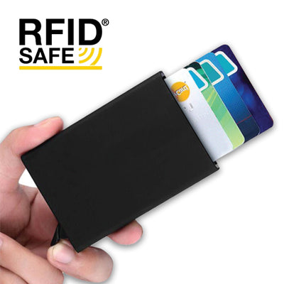Black metal card holder held in a hand with example cards extending from the top; catalogue RFID Safe graphic shown