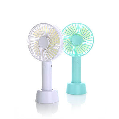 White and pale blue-green portable fans standing on removable bases with circular grilles