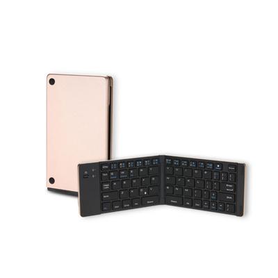 wireless foldable keyboard with open black keys and a folded rose-gold finish example