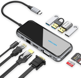 Vention 10-in-1 USB-C Docking Station with multiple ports and cables for versatile connectivity.