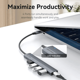 Vention 5-in-1 USB-C Mini Hub connected to a laptop, showcasing 4 ports for seamless connectivity.