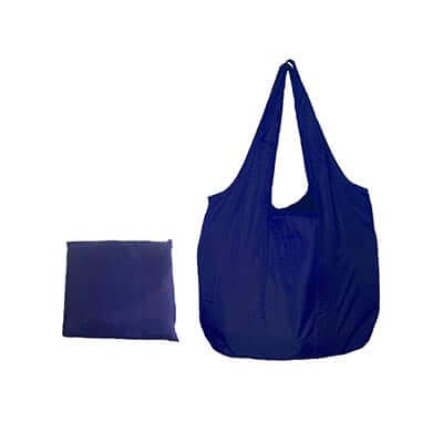 Blue foldable nylon tote shown open beside its matching square storage form