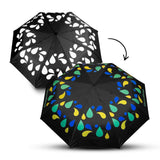 Colour Changing Compact Umbrella showing vibrant colors when wet, perfect corporate gift Singapore.