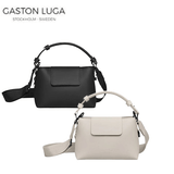 Gaston Luga Splashini Crossbody in black and white, a versatile and waterproof corporate gift for stylish individuals.