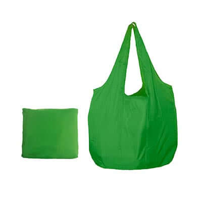 Green foldable nylon tote shown open beside its matching square storage form
