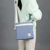 Crossing Remi Crossbody Bag worn by a person, showcasing style and functionality, ideal as a corporate gift.
