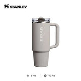 STANLEY The 30oz Quencher ProTour Flip Straw Tumbler (0.88L) in light gray with handle and straw lid.
