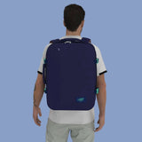 Cabinzero Classic Ultra Light Cabin Bag With Luggage Trackers 44L worn by a man from behind, showcasing its spacious design.
