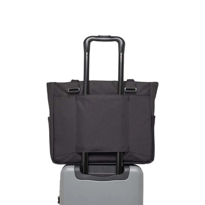 Herschel Kaslo Tote Tech Bag shown mounted on a suitcase, ideal for corporate gift for travelers.