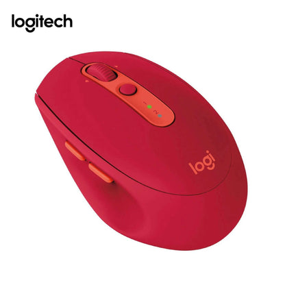 Red Logitech M590 mouse with orange centre strip and side buttons, showing scroll wheel and two-channel indicator