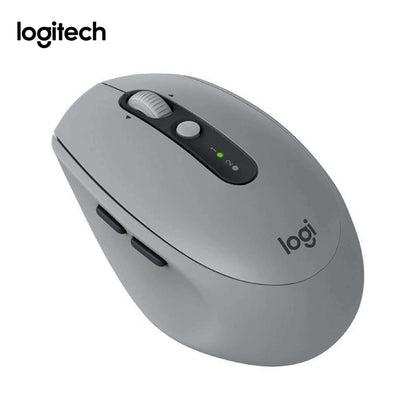Light grey Logitech M590 mouse with black centre strip and side buttons, showing scroll wheel and Easy-Switch control