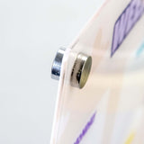 Close-up of the metal magnet on the Magnetic Fridge Planner, highlighting its secure attachment.