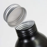 Close-up of the Octiva Aluminium Bottle with screw-on cap, showcasing its recycled aluminium design and lightweight structure.