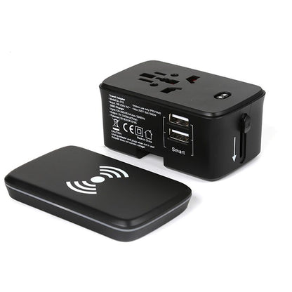 Black travel adaptor base beside the detached flat wireless charging pad, shown as the two separate components