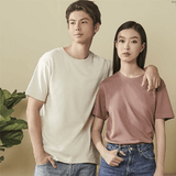 Regular Round Neck Superb Cotton T-shirt displayed on two models, showcasing versatility and style in casual wear.