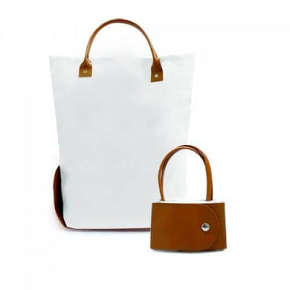 White Zotcof tote with brown handles, shown open beside its compact folded form
